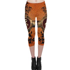 Wonderful Golden Clef On A Button With Floral Elements Capri Leggings