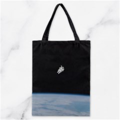 Astronaut Floating Above The Blue Planet Classic Tote Bag by Nexatart