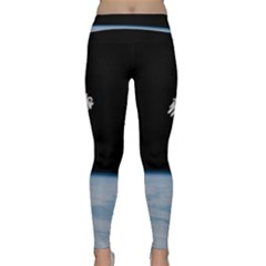 Astronaut Floating Above The Blue Planet Classic Yoga Leggings by Nexatart