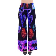 Grunge Abstract In Black Grunge Effect Layered Images Of Texture And Pattern In Pink Black Blue Red Pants by Nexatart