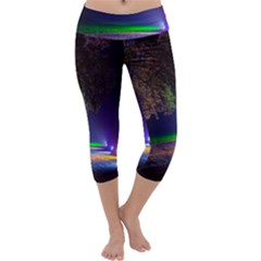 Illuminated Trees At Night Capri Yoga Leggings by Nexatart