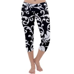 Black And White Floral Patterns Capri Yoga Leggings by Nexatart