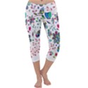 Prismatic Psychedelic Floral Heart Background Capri Yoga Leggings View1