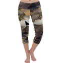 The Lonely Wolf On The Flying Rock Capri Yoga Leggings View1