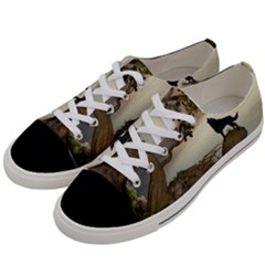 The Lonely Wolf On The Flying Rock Women s Low Top Canvas Sneakers by FantasyWorld7