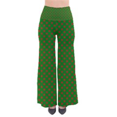 Red Stars On Christmas Green Background Pants by PodArtist