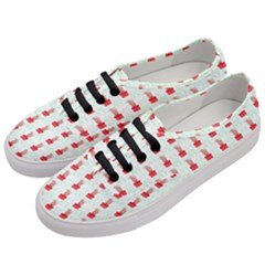 At On Christmas Present Background Women s Classic Low Top Sneakers by Celenk