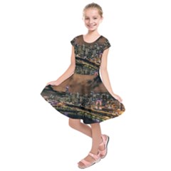 Cityscape Night Buildings Kids  Short Sleeve Dress by Simbadda