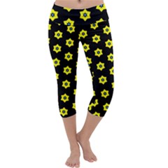 Pattern Yellow Stars Black Background Capri Yoga Leggings by Simbadda