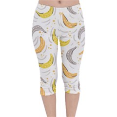 Seamless Stylish Pattern With Fresh Yellow Bananas Background Velvet Capri Leggings  by Wegoenart