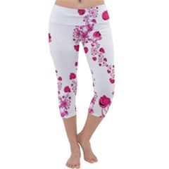 Abstract Pink Roses On White Capri Yoga Leggings by SpinnyChairDesigns