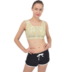 Gold Stars Pattern V-back Sports Bra by SpinnyChairDesigns