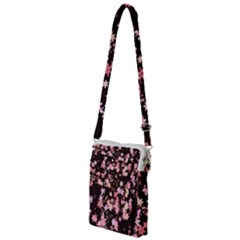 Pink Lilies On Black Multi Function Travel Bag by SpinnyChairDesigns