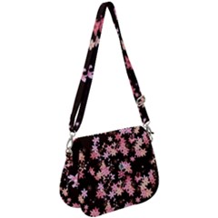 Pink Lilies On Black Saddle Handbag by SpinnyChairDesigns