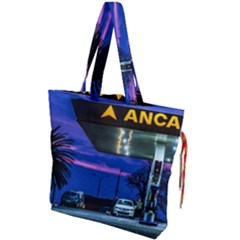 Night Scene Gas Station Building, Montevideo, Uruguay Drawstring Tote Bag by dflcprintsclothing