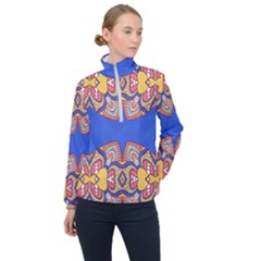 Yellow Red Shapes On A Blue Background                                                          Women Half Zip Windbreaker by LalyLauraFLM