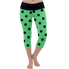 Large Black Polka Dots On Algae Green - Capri Yoga Leggings by FashionLane