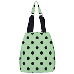 Large Black Polka Dots On Pale Green - Center Zip Backpack by FashionLane