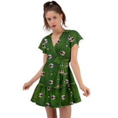 One Island In A Safe Environment Of Eternity Green Flutter Sleeve Wrap Dress by pepitasart