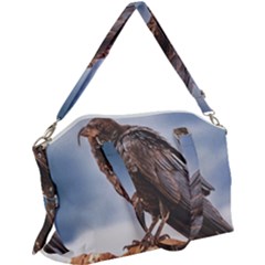 Black Crow Standing At Rock Canvas Crossbody Bag by dflcprintsclothing