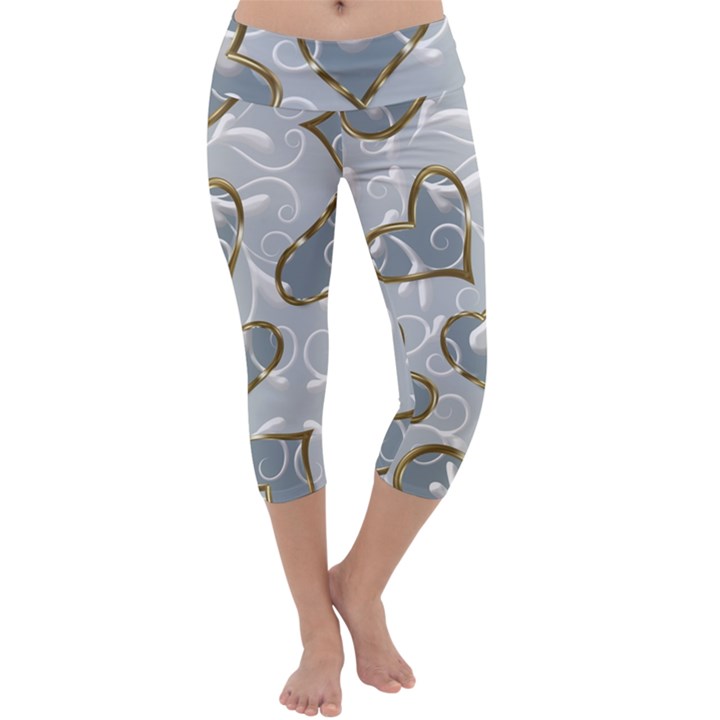   Gold hearts on a blue background Capri Yoga Leggings