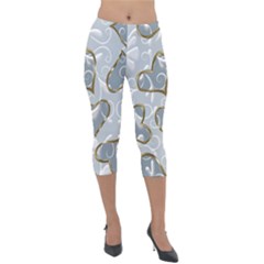   Gold Hearts On A Blue Background Lightweight Velour Capri Leggings  by Galinka