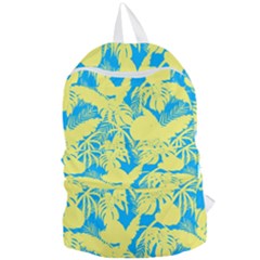 Yellow And Blue Leafs Silhouette At Sky Blue Foldable Lightweight Backpack by Casemiro