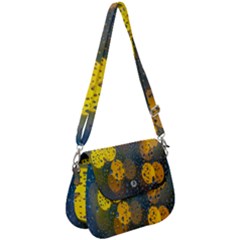 Bokeh Raindrops Window  Saddle Handbag by artworkshop