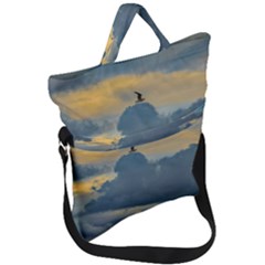 Bird Flying Over Stormy Sky Fold Over Handle Tote Bag by dflcprintsclothing