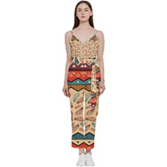 Ethnic-tribal-pattern-background V-neck Spaghetti Strap Tie Front Jumpsuit by Vaneshart