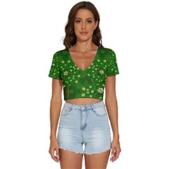 Lotus Bloom In Gold And A Green Peaceful Surrounding Environment V-neck Crop Top by pepitasart