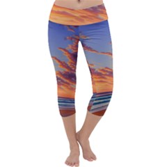 Summer Sunset Over Beach Capri Yoga Leggings by GardenOfOphir