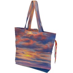 Serene Sunset Over Beach Drawstring Tote Bag by GardenOfOphir