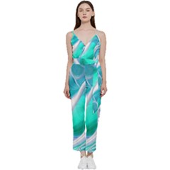 Pastel Simple Wave V-neck Spaghetti Strap Tie Front Jumpsuit by GardenOfOphir