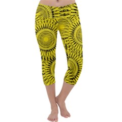 Abstract Sun Pattern Yellow Background Capri Yoga Leggings