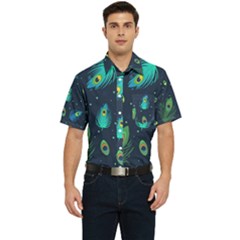 Blue Background Pattern Feather Peacock Men s Short Sleeve Pocket Shirt  by Semog4