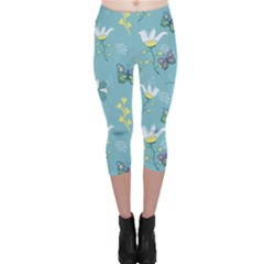 Butterfly Flower Blue Background Capri Leggings  by danenraven