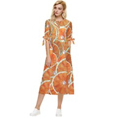 Oranges Background Texture Pattern Bow Sleeve Chiffon Midi Dress by Simbadda