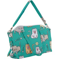 Seamless-pattern-cute-cat-cartoon-with-hand-drawn-style Canvas Crossbody Bag by Simbadda