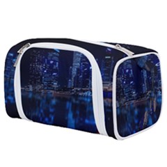 Illuminated Cityscape Against Blue Sky At Night Toiletries Pouch by Modalart