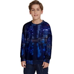 Illuminated Cityscape Against Blue Sky At Night Kids  Crewneck Sweatshirt by Modalart