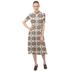 Brown Snake Skin Keyhole Neckline Chiffon Dress by ConteMonfrey