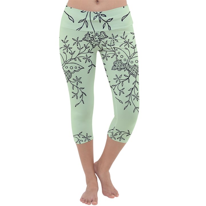 Illustration Of Butterflies And Flowers Ornament On Green Background Capri Yoga Leggings