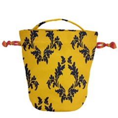 Yellow Regal Filagree Pattern Drawstring Bucket Bag by Azkajaya