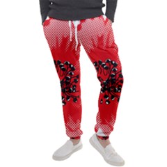 A Red Flower With A Black Center On A Black Background Men s Jogger Sweatpants by catchydesignhill