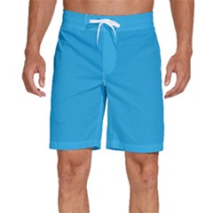 A Blue Background With A Black And White Cat On Top Of It Men s Beach Shorts by catchydesignhill