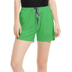 A Green Background With A White Border Women s Runner Shorts by catchydesignhill