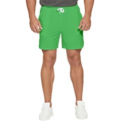 A Green Background With A White Border Men s Runner Shorts by catchydesignhill