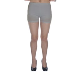 A Man In A Suit And Tie Standing In Front Of A Wall Skinny Shorts by catchydesignhill