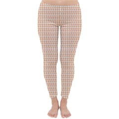 An Orange And White Pattern On A White Background Classic Winter Leggings